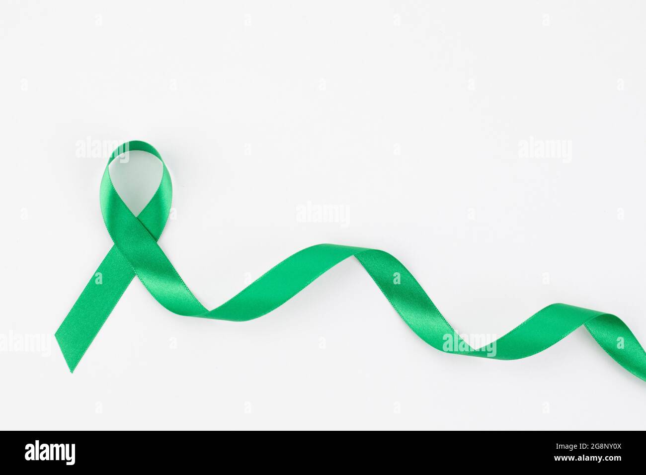 green ribbon on white background Stock Photo Alamy