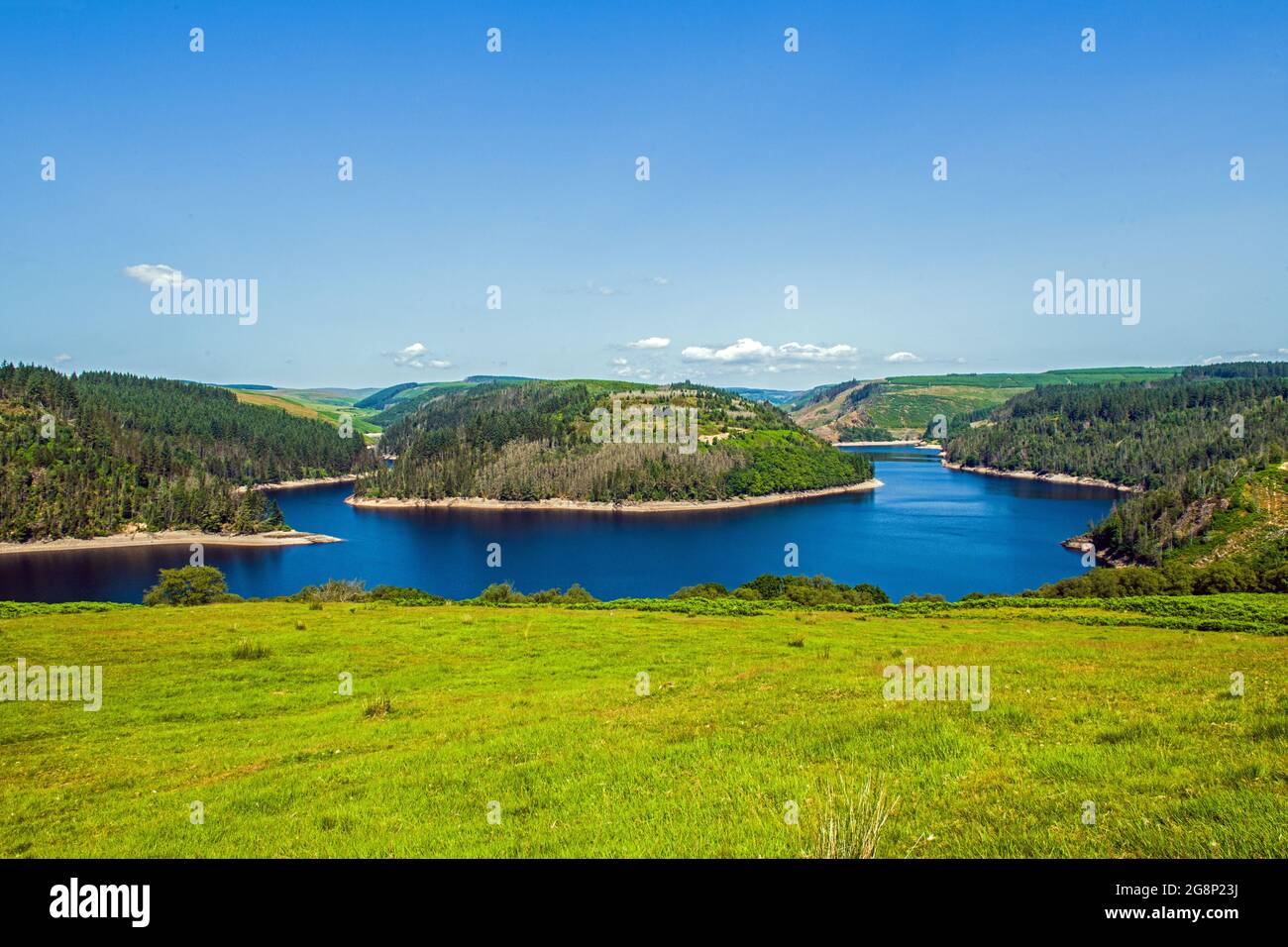 A wider view of Llyn Brianne Reservoir high up in the Carmarthershire Hills on a sunny July Day Stock Photo