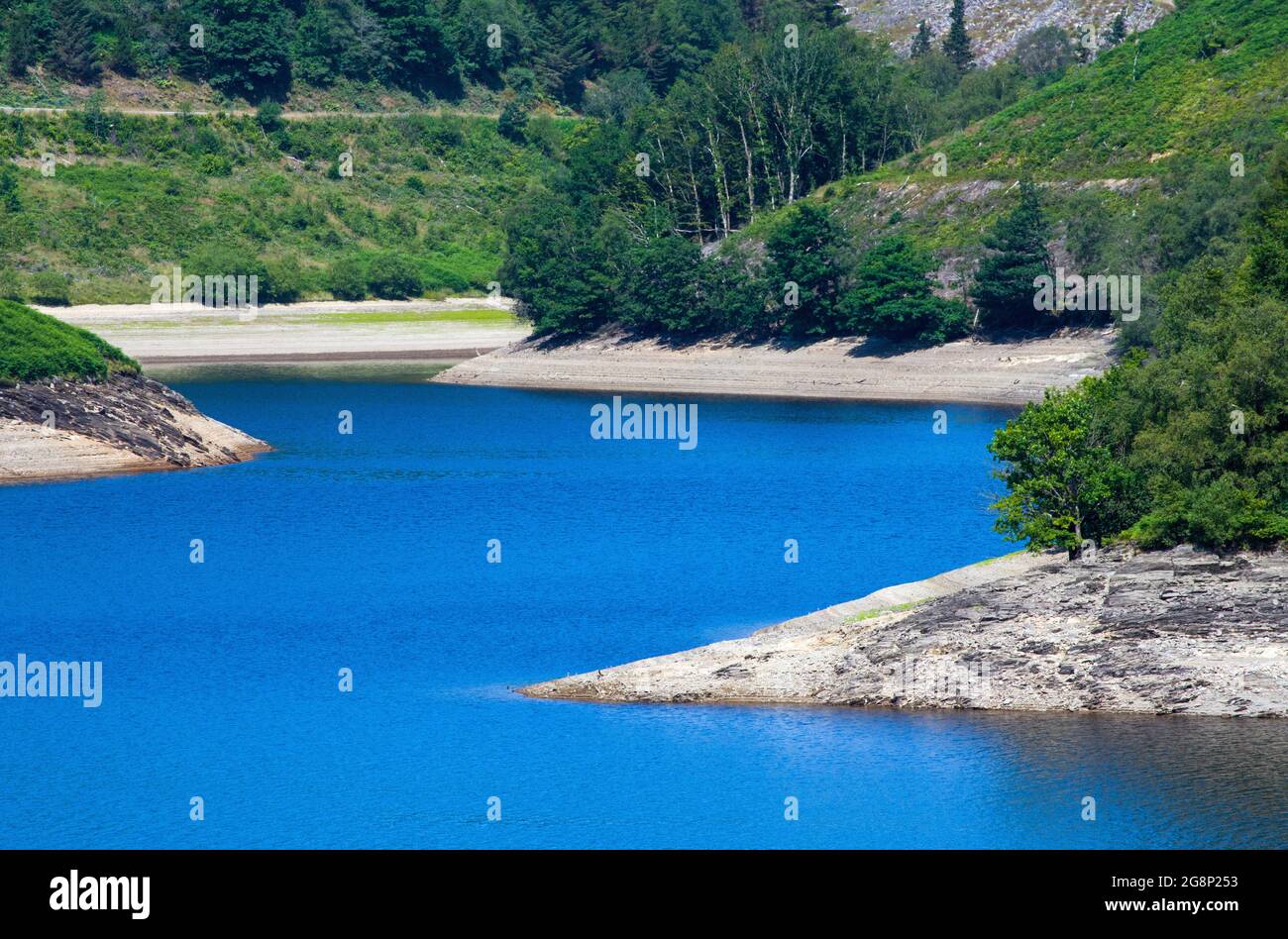 A close up photo of the Llyn Brianne Reservoir at the top of the Tywi Valley in Carmarthenshire on a sunny July Day Stock Photo