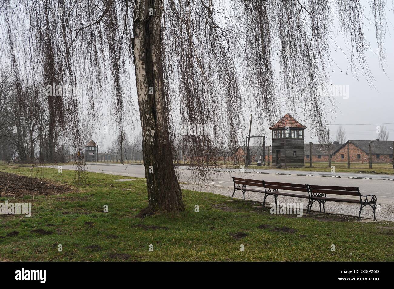 16.03.2015, Auschwitz, Lesser Poland, Poland, Europe - View from outside of the former Auschwitz II concentration camp in Birkenau by surrounded fence. Stock Photo