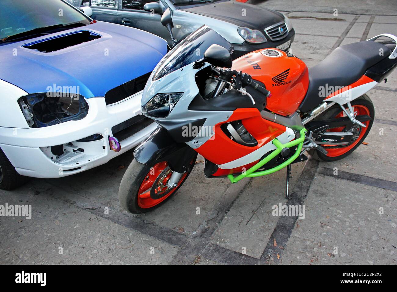 Kiev, Ukraine - September 11, 2014: Honda CBR and Subaru Impreza STI in the city Stock Photo