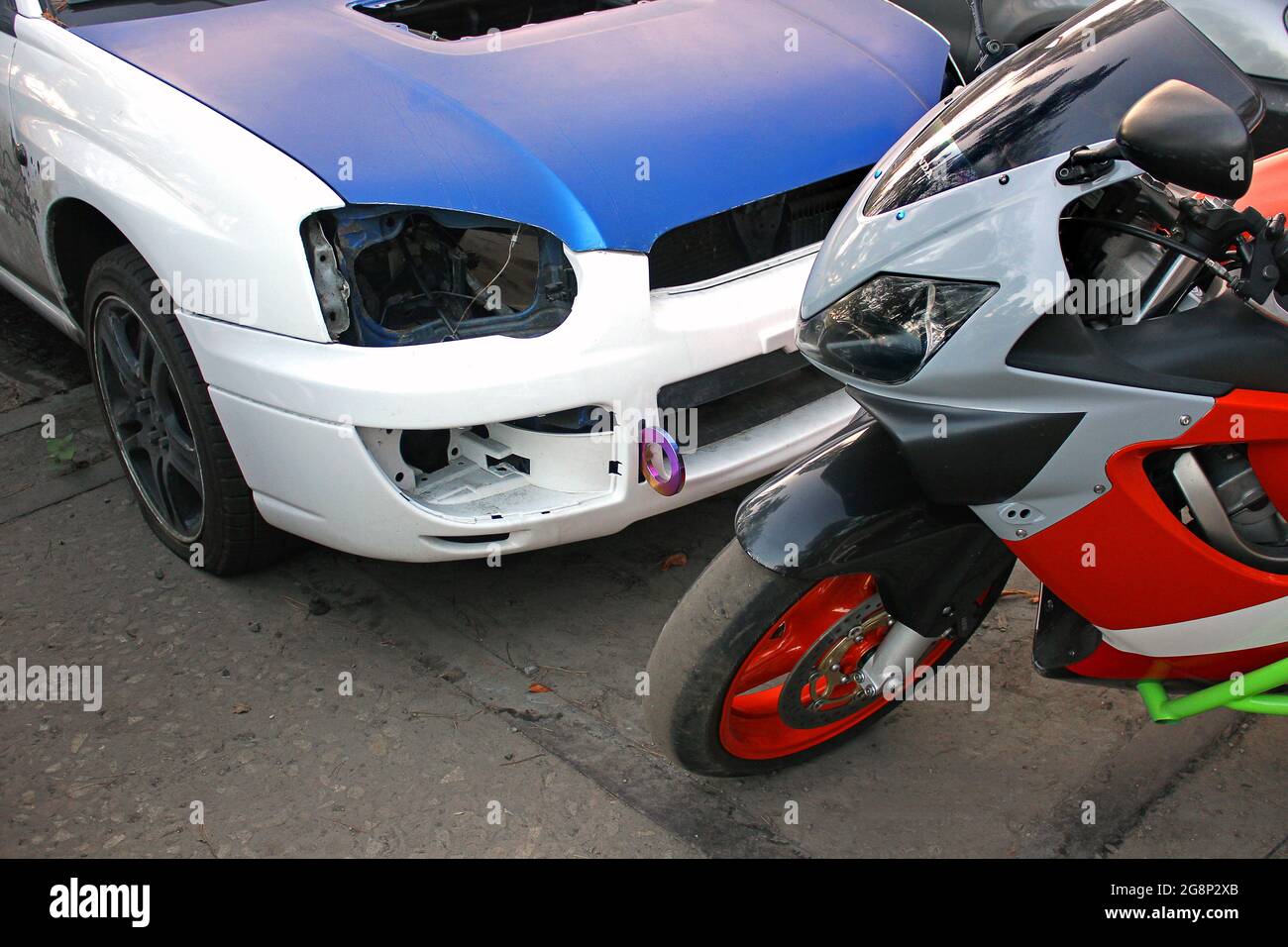 Kiev, Ukraine - September 11, 2014: Honda CBR and Subaru Impreza STI in the city Stock Photo