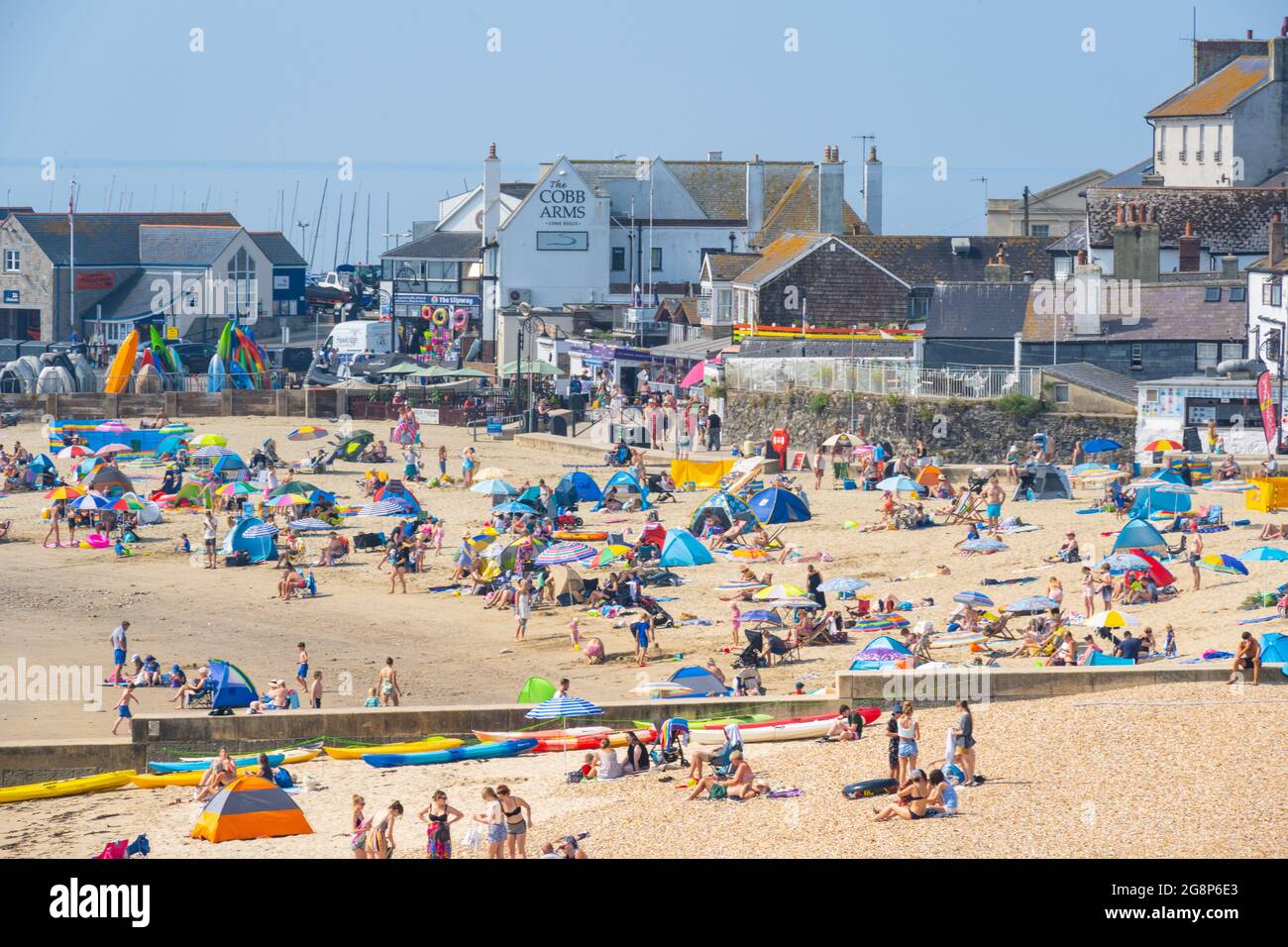 Lyme Regis, Dorset, UK. 22nd July, 2021. UK Weather Holiday makers