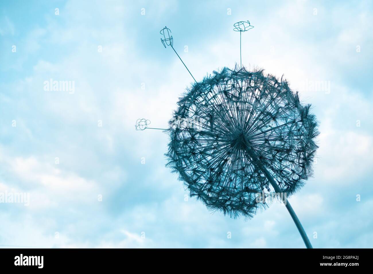 Street decorative lamp in the form of large dandelion against the sky. Stock Photo
