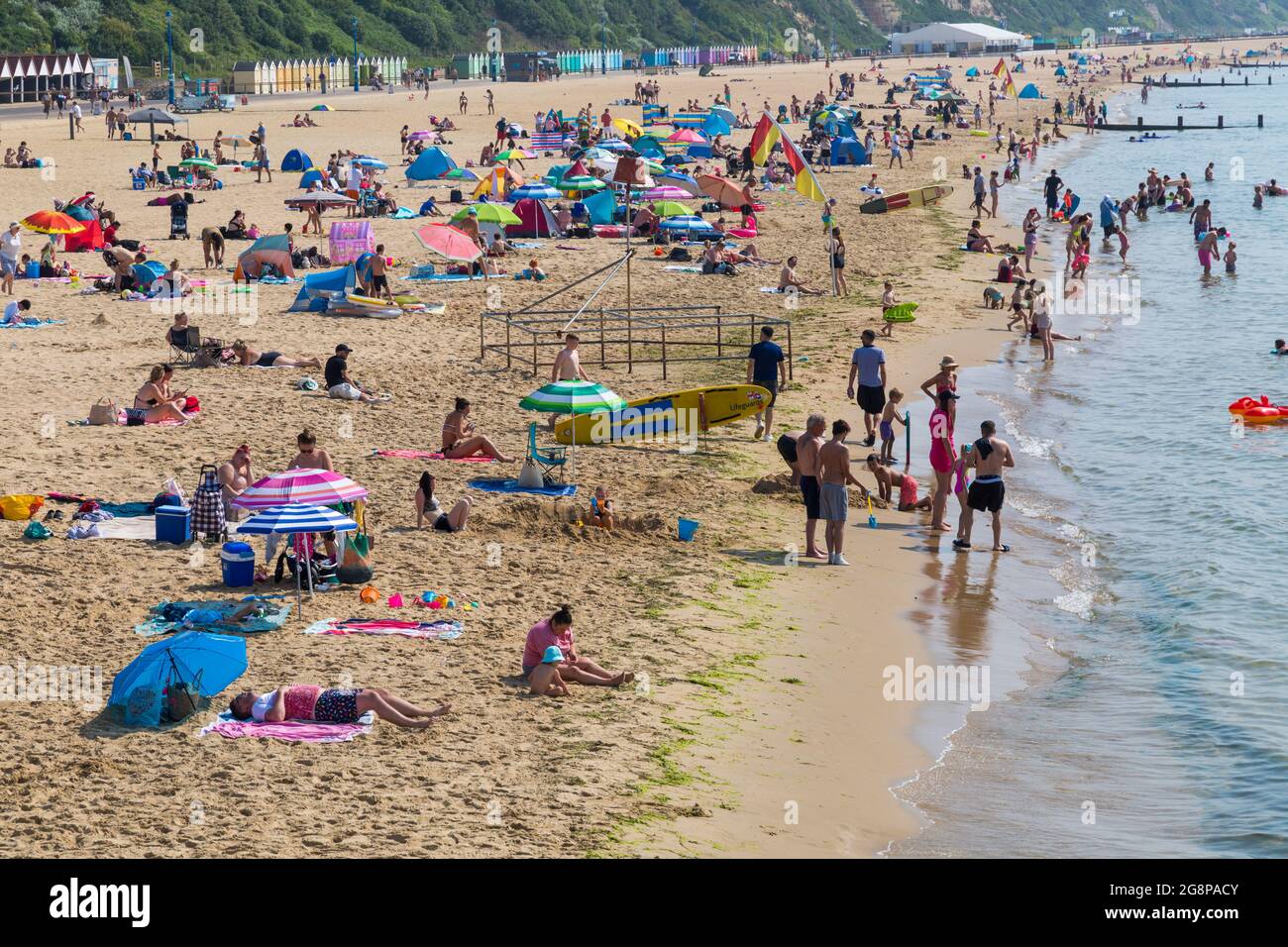 Bournemouth, Dorset UK. 22nd July 2021. UK weather: another hot, sunny and humid day at Bournemouth beaches as the heatwave continues and sunseekers head to the seaside to enjoy the sunshine.  Credit: Carolyn Jenkins/Alamy Live News Stock Photo