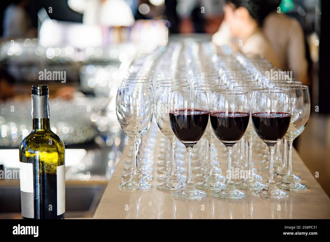 red wine in glasses waiting for dinner party time Stock Photo