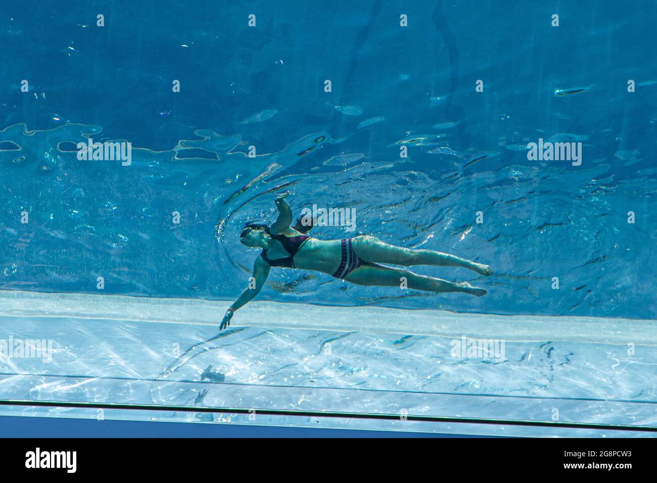 VAUXHALL LONDON 22 July 2021 . A swimmer cooling off at the 25 m long