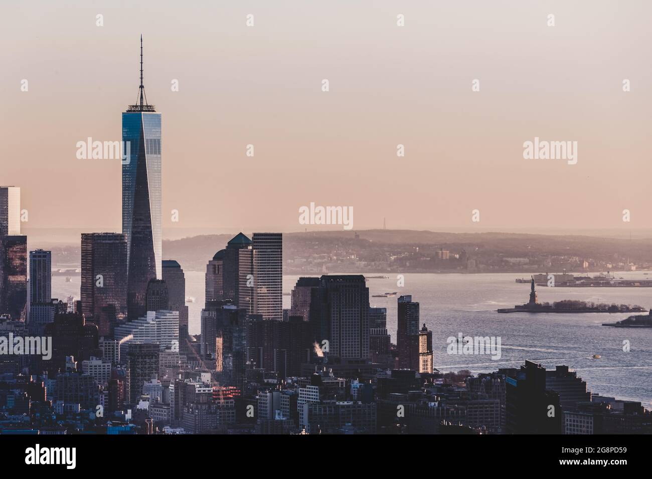 New York City Manhattan downtown skyline at sunset Stock Photo - Alamy