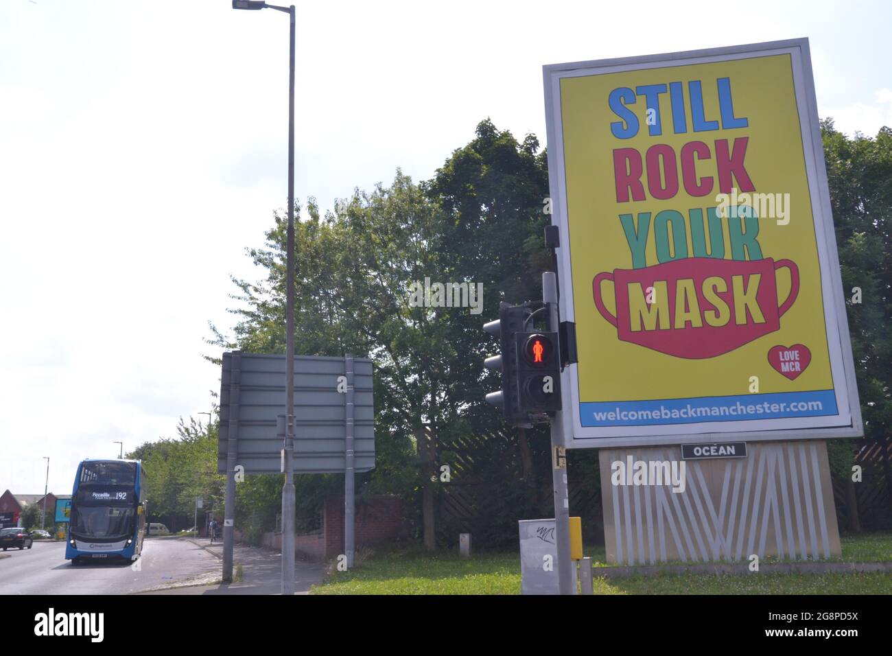 Manchester, UK. 22nd July, 2021. Most recent figures for Greater Manchester:308 patients with the Covid virus were admitted to NHS hospitals in the week to 11th July, an increase of 29 per cent on the prior week. Sign in Manchester encourages people to wear a mask. Credit: Terry Waller/Alamy Live News Stock Photo