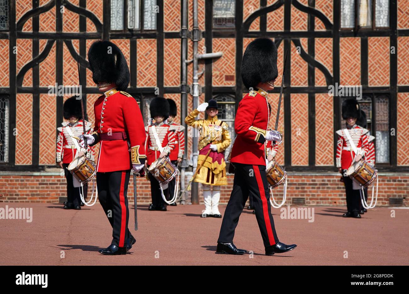 Members of the 1st Battalion Grenadier Guards take part in the Changing of the Guard at Windsor Castle in Berkshire, which is taking place for the first time since the start of the coronavirus pandemic. Picture date: Thursday July 22, 2021. Stock Photo