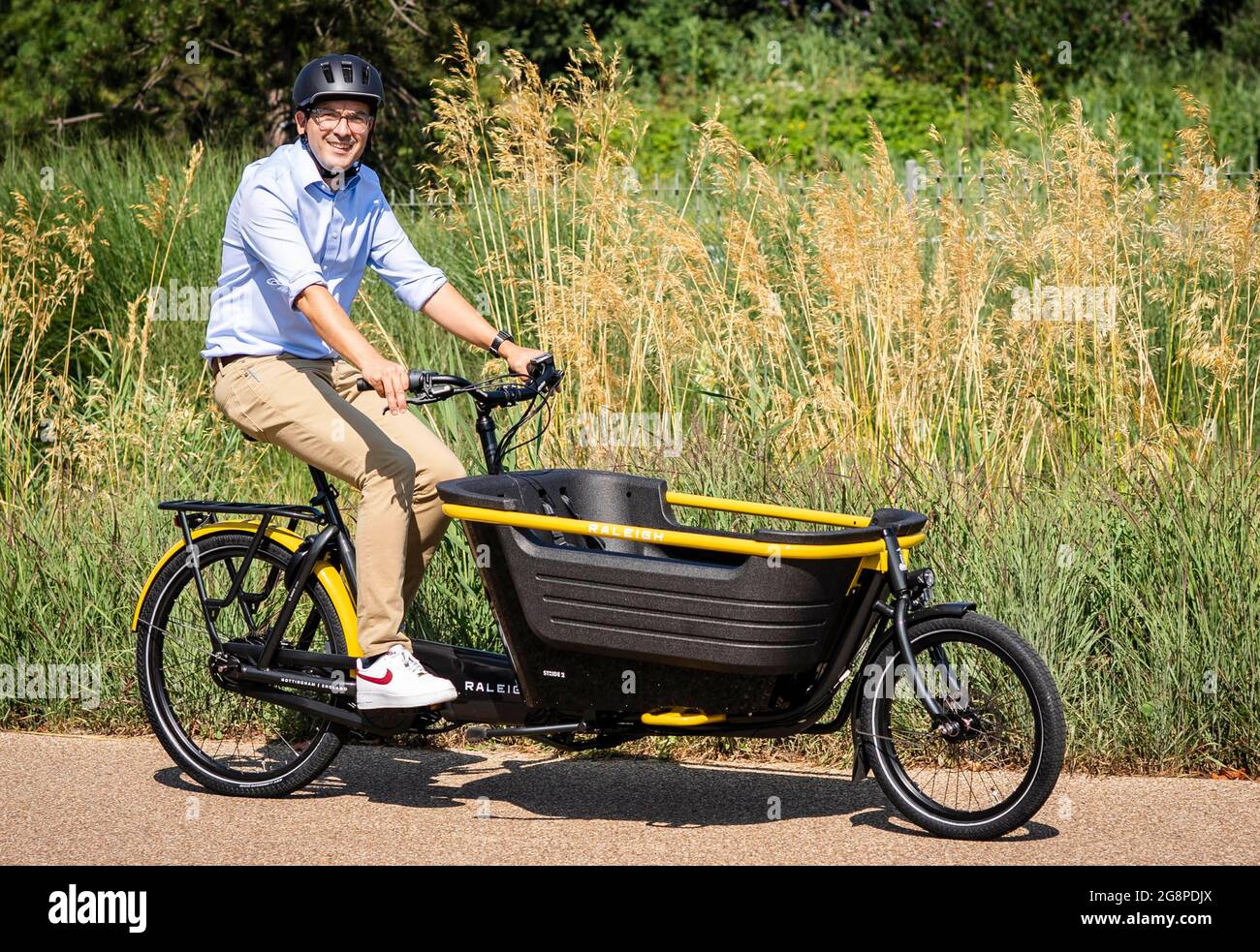 EDITORIAL USE ONLY Will Norman, Mayor of London's Cycling and Walking  Commissioner rides a new Raleigh Stride E-cargo bike during its launch  event at Lee Valley Velopark, London. Picture date: Thursday July