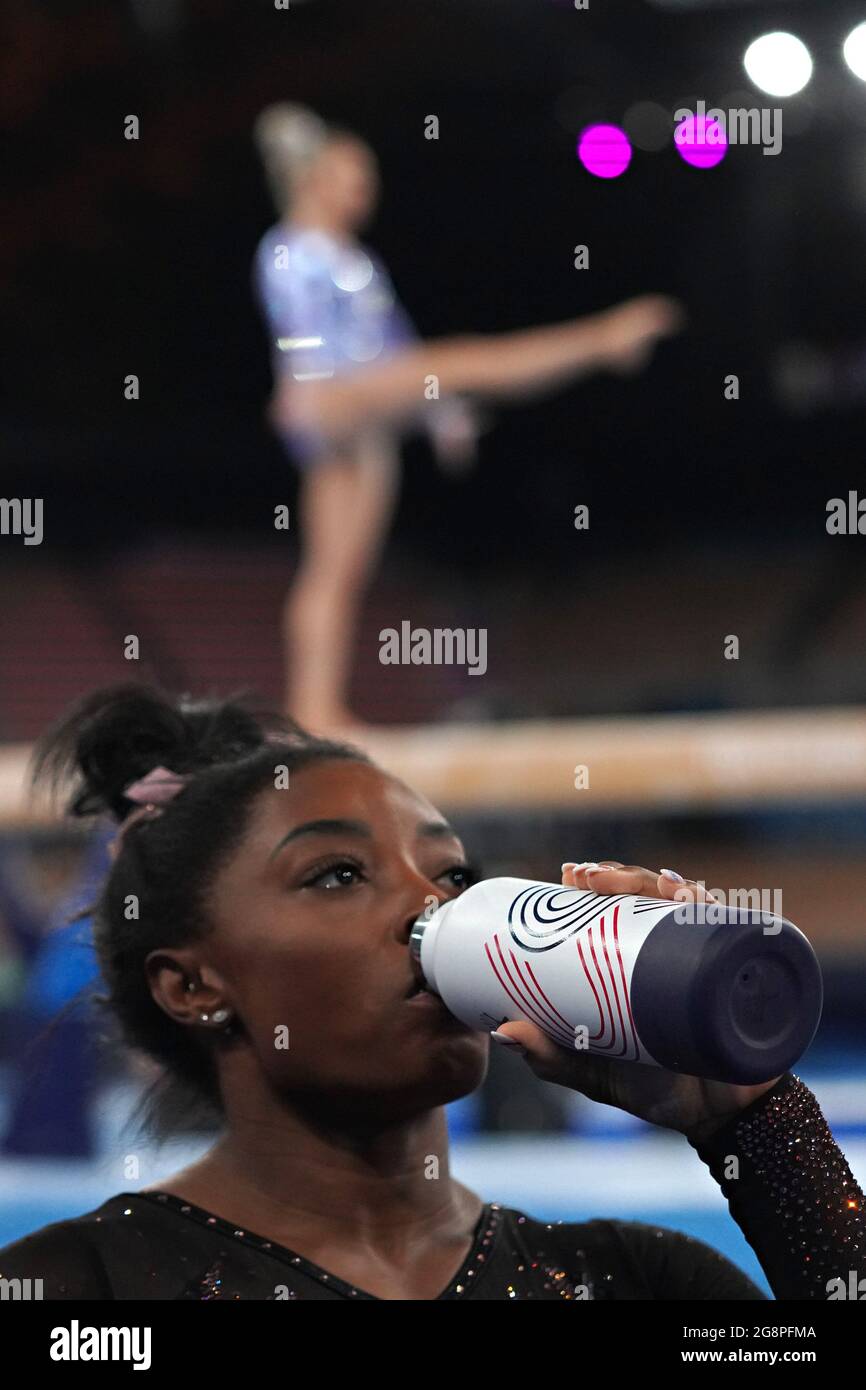 Tokyo, Japan. 22nd July, 2021. United States Gymnast Simone Biles, takes a water break as teammate Mykayla Skinner practices on the balance beam at Ariake Gymnastics Centre before the start of the Tokyo Olympic Games in Tokyo, Japan, on Thursday July 22, 2021. Photo by Richard Ellis/UPI. Credit: UPI/Alamy Live News Stock Photo