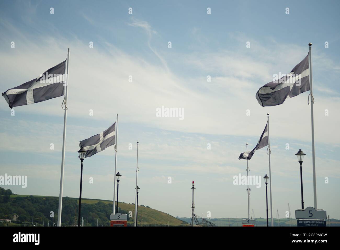 Flags of Cornwall blowing in the wind at Falmouth Stock Photo