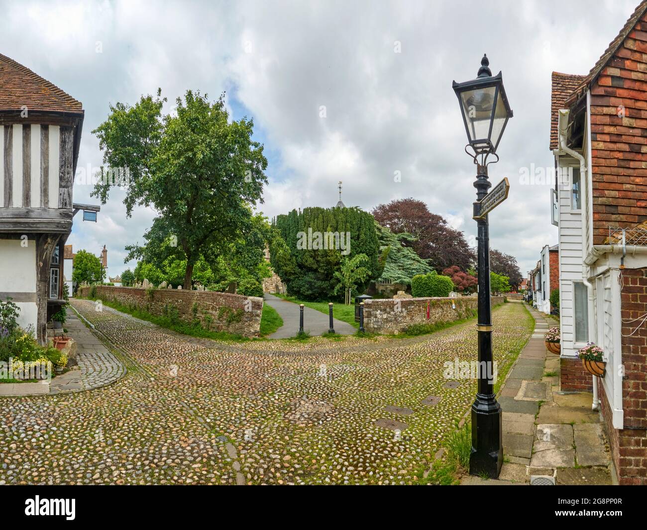 Rye town corner of Church Square and Watchbell St with St Mary's Churchyard in Rother East Sussex a Cinque Port Stock Photo