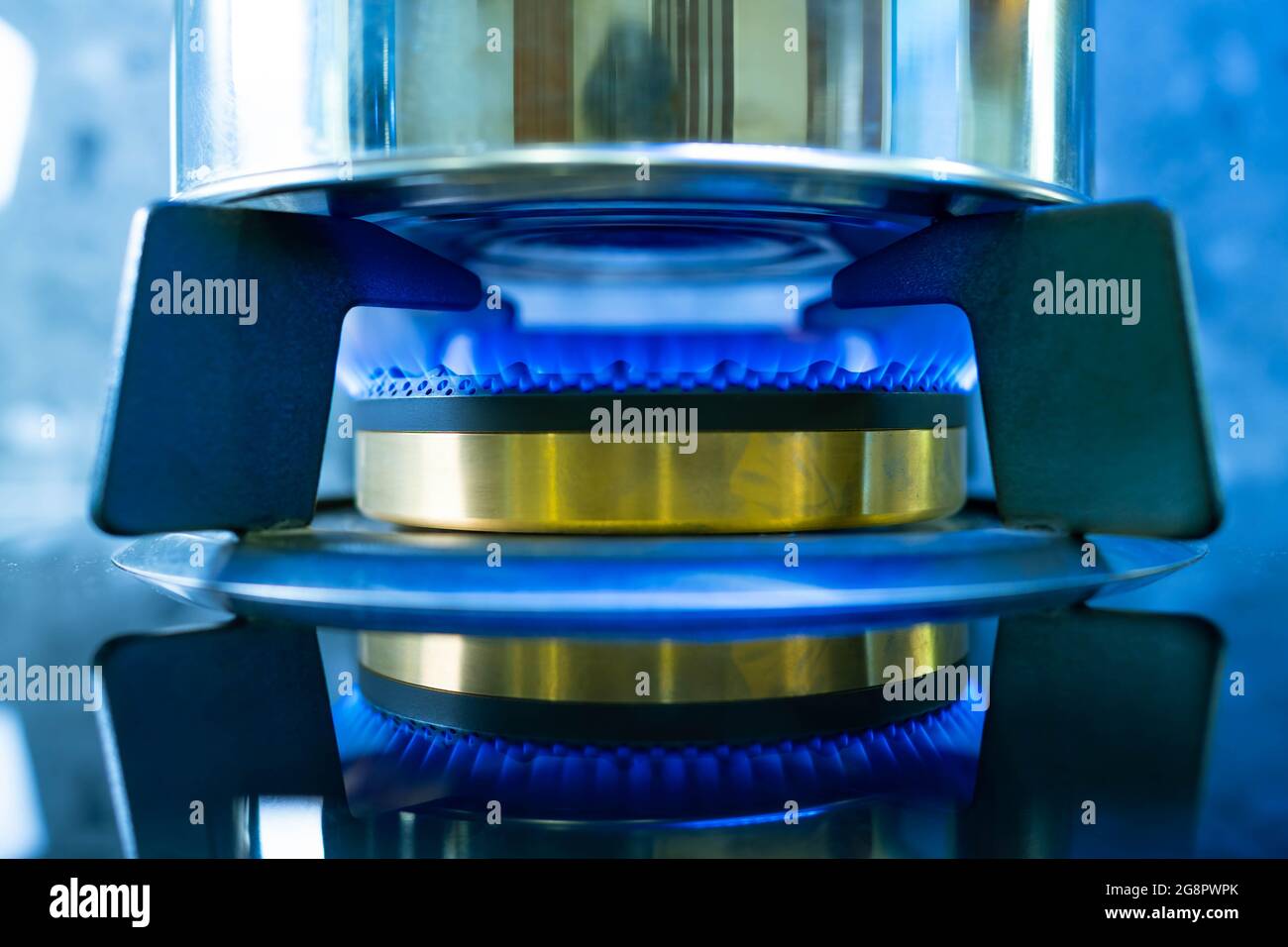 Open the gas valve and put the pot on the stove Stock Photo Alamy