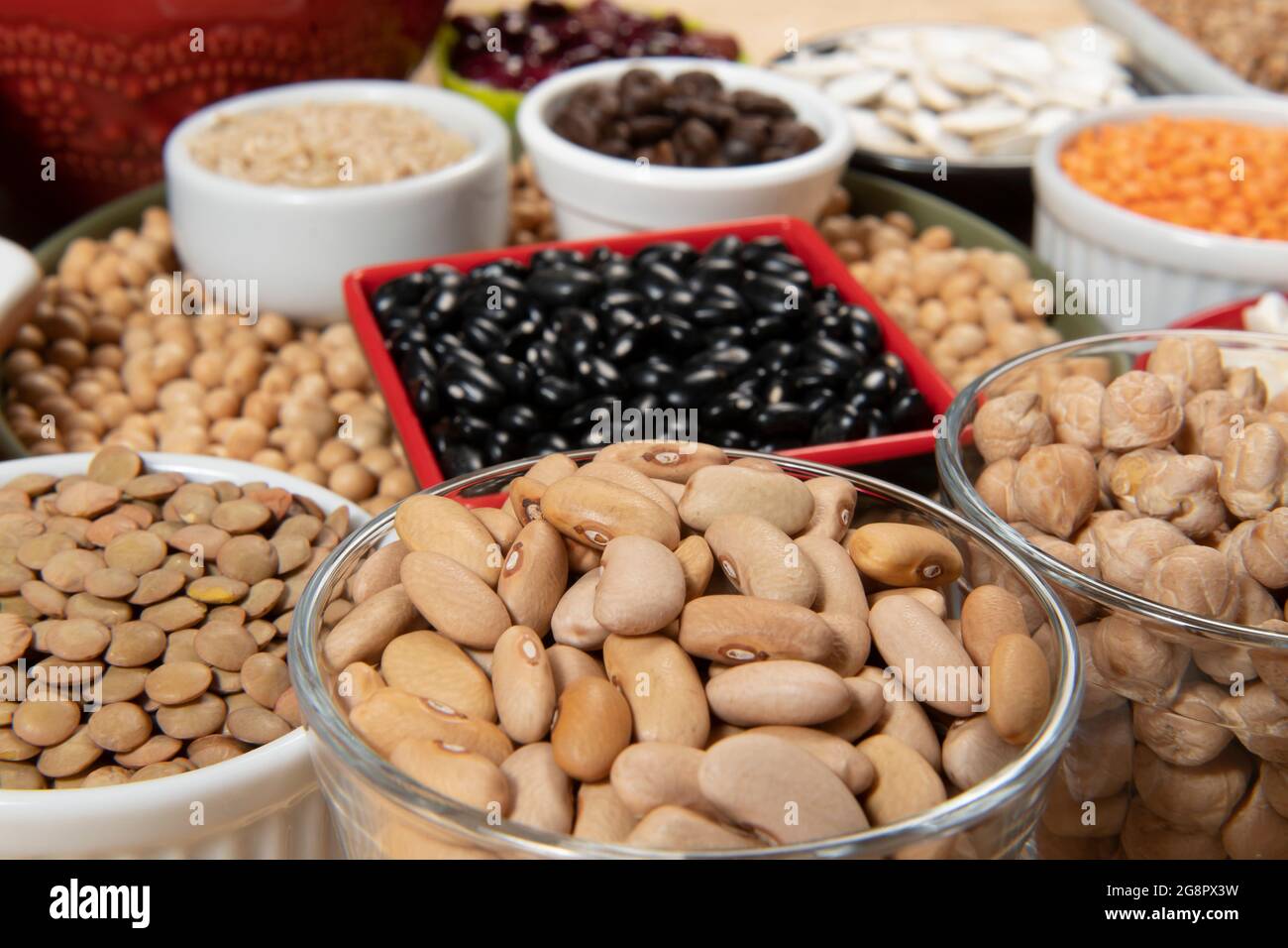 Collection of different cereal varieties and edible dry seeds. Examples