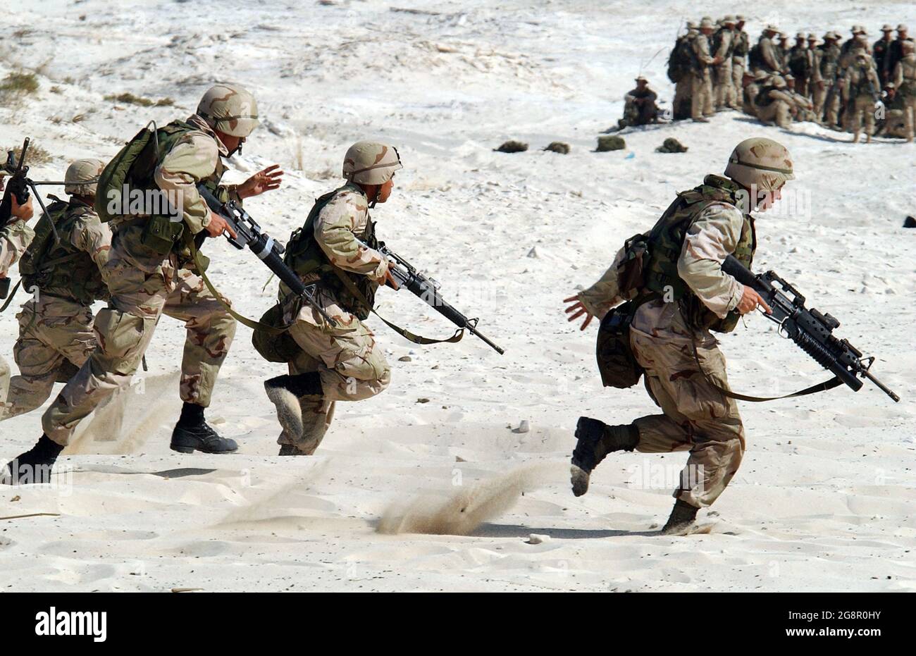 Army soldiers fighting at war and the called Infantry are sometimes called 'grunts' (in the United States Army) or 'squaddies' (in the British Army). Stock Photo