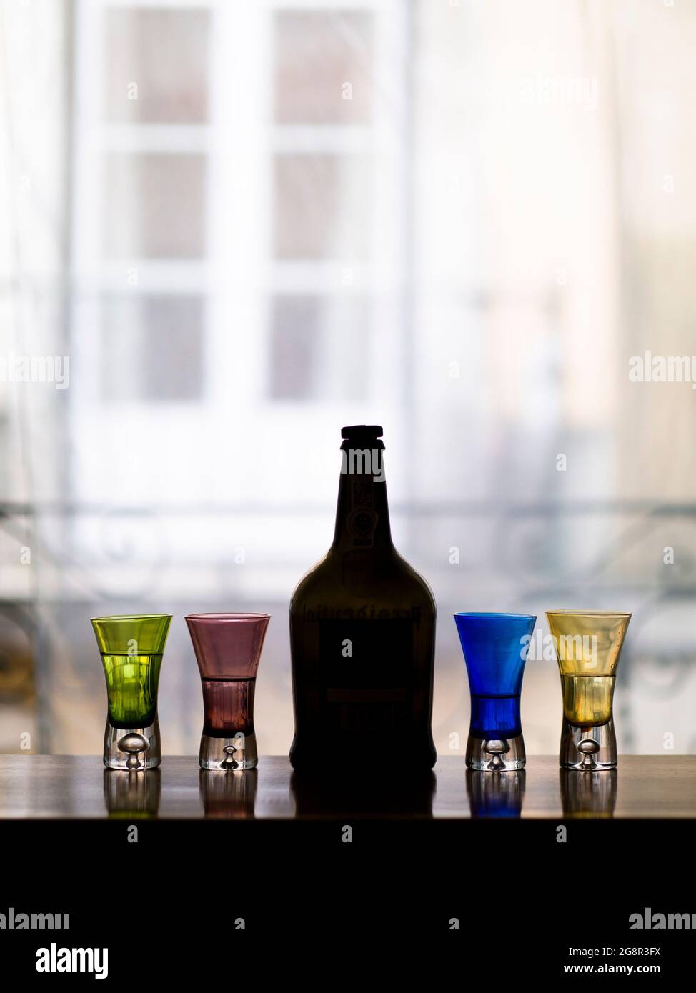 Bottle and shot glass Stock Photo Alamy