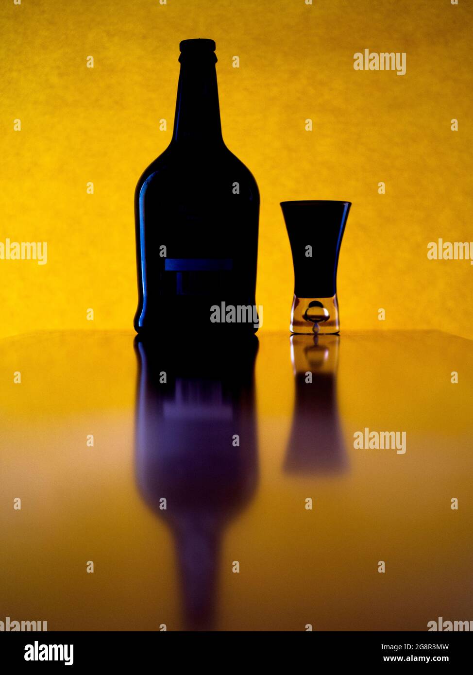 Bottle and shot glass Stock Photo Alamy