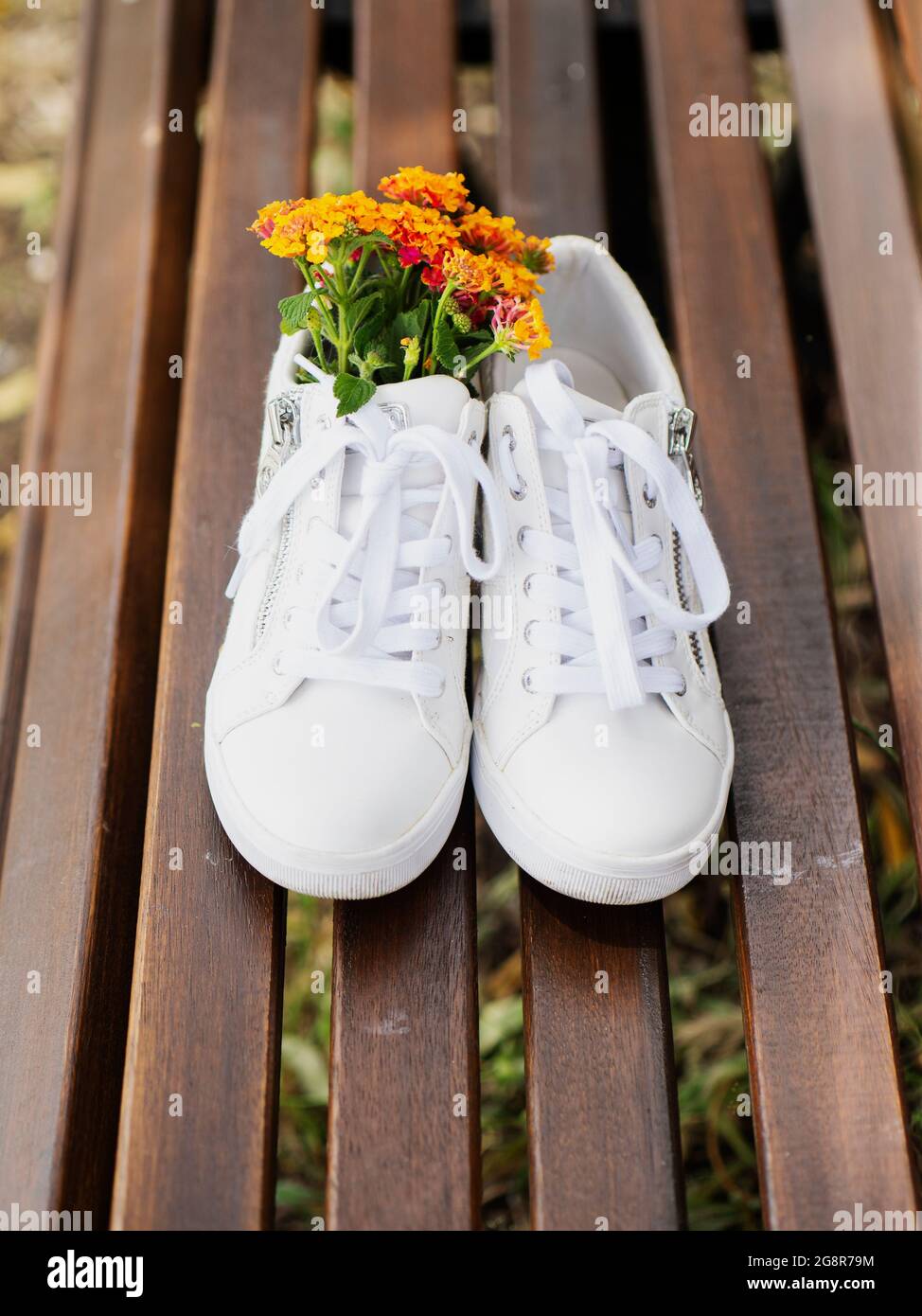 Sneakers with shop flowers on them
