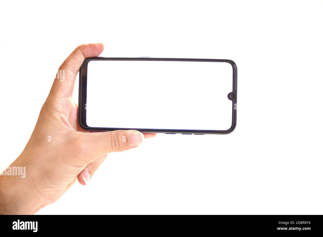 The hand holding black smartphone, blank white screen phone isolated on ...