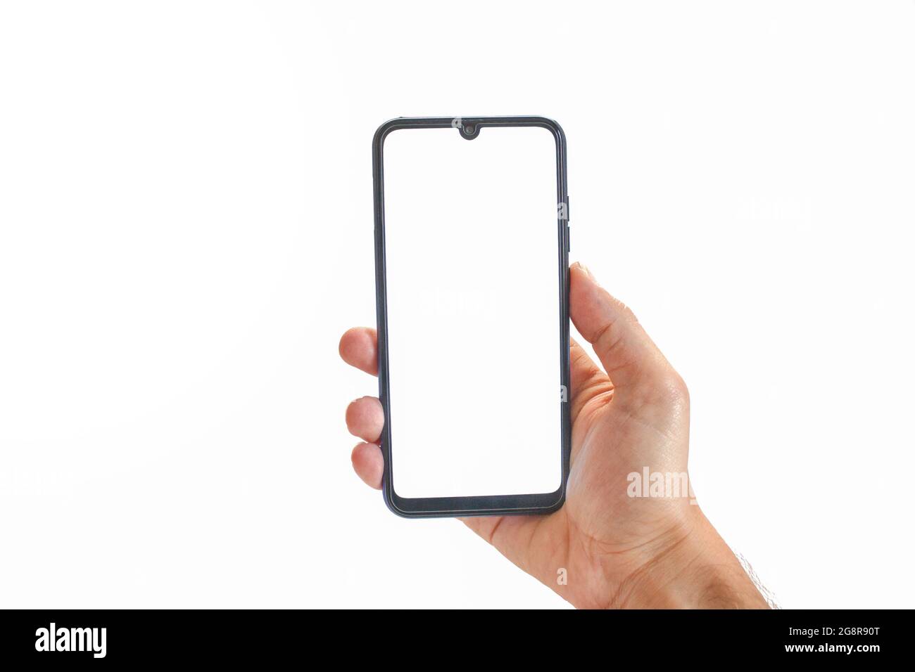 The hand holding black smartphone, blank white screen phone isolated on ...