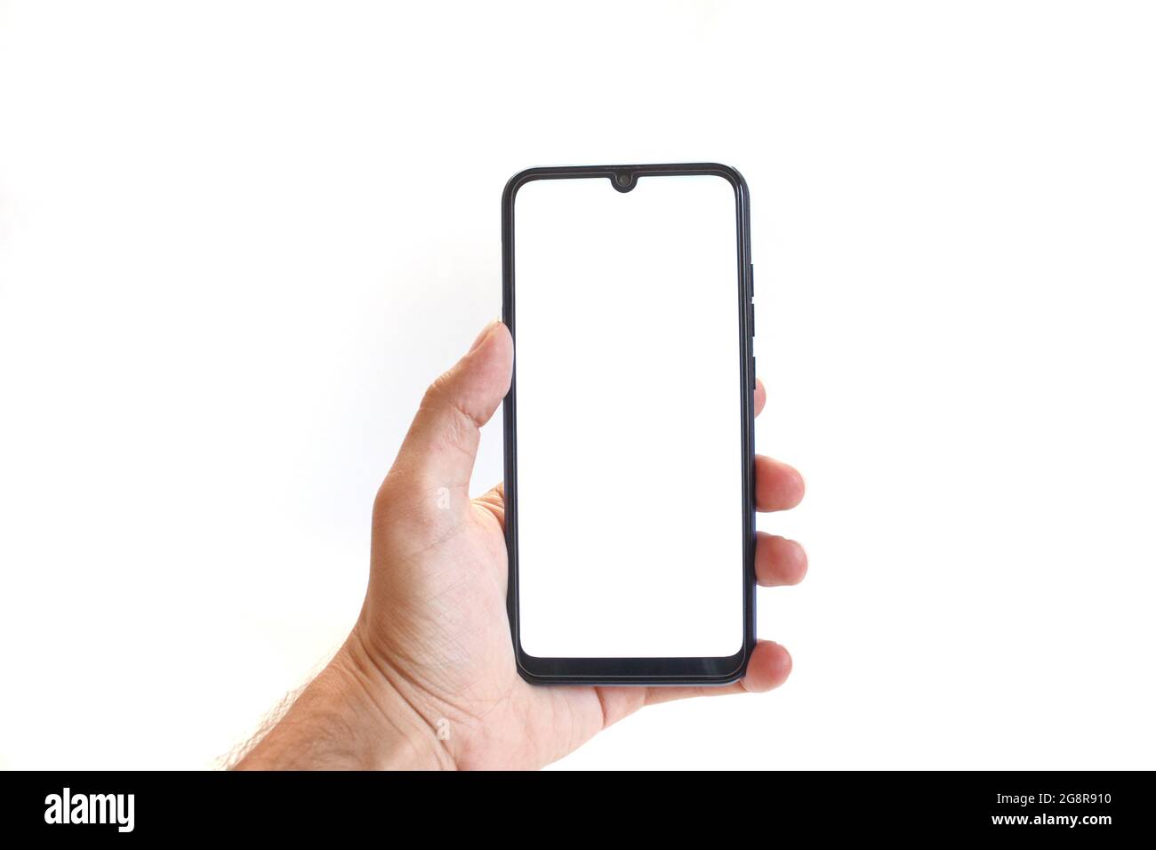 The hand holding black smartphone, blank white screen phone isolated on ...