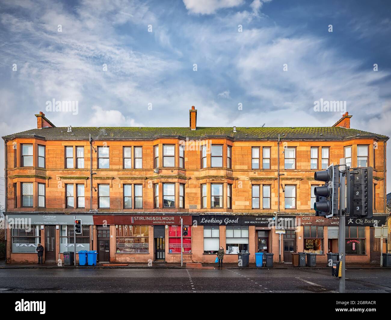 CLYDEBANK, SCOTLAND - FEBRUARY 10, 2014: A typical red sandstone tenement block in the Clydebank area to the west of the city Glasgow. Stock Photo