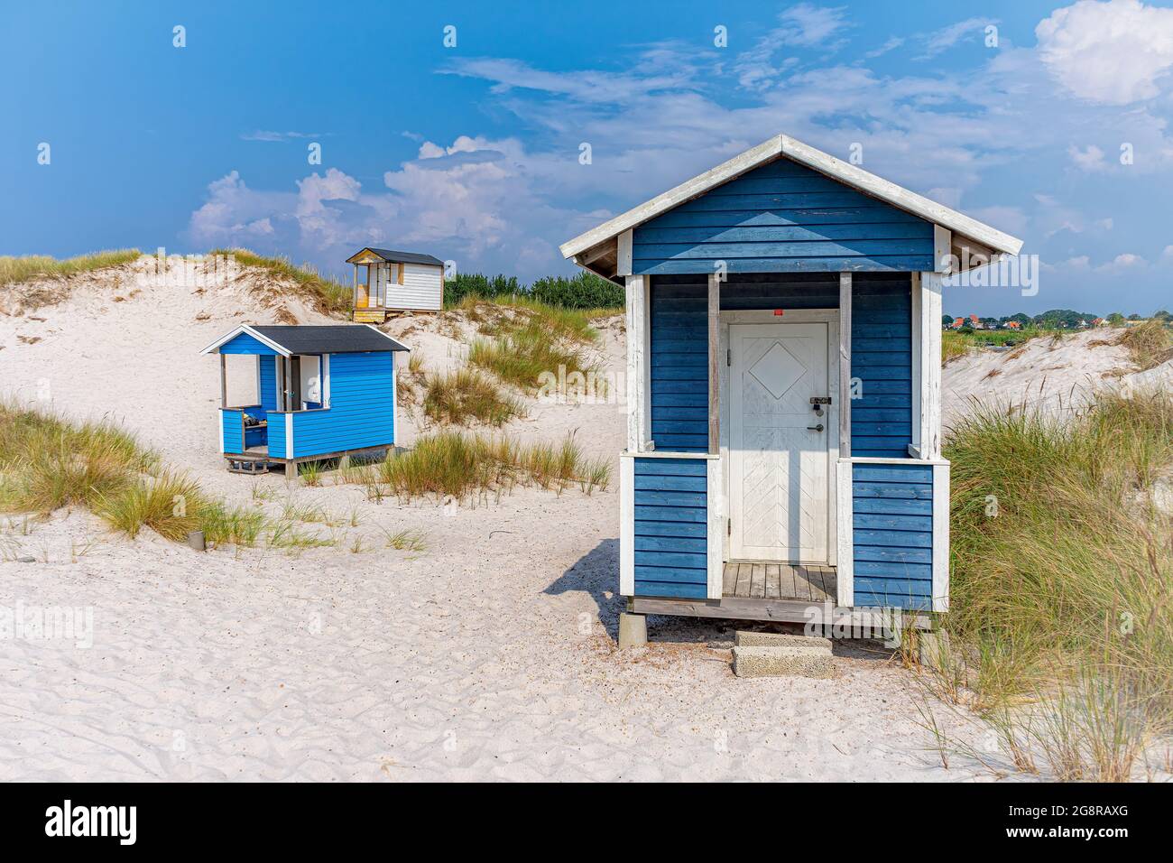 The colourful huts at skanor white sand beach in the skane region of Sweden. Stock Photo