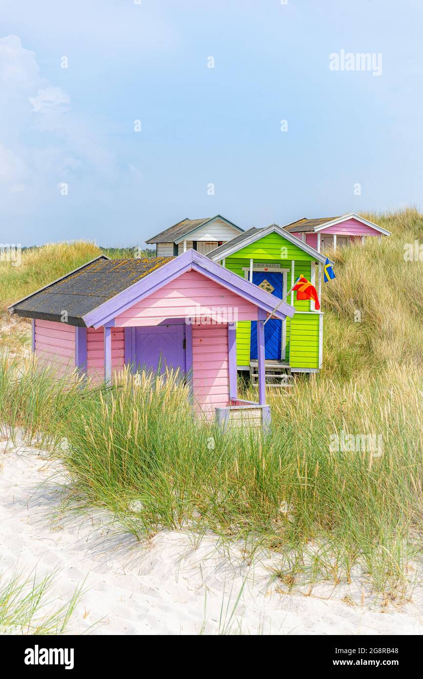 The colourful huts at skanor white sand beach in the skane region of Sweden. Stock Photo