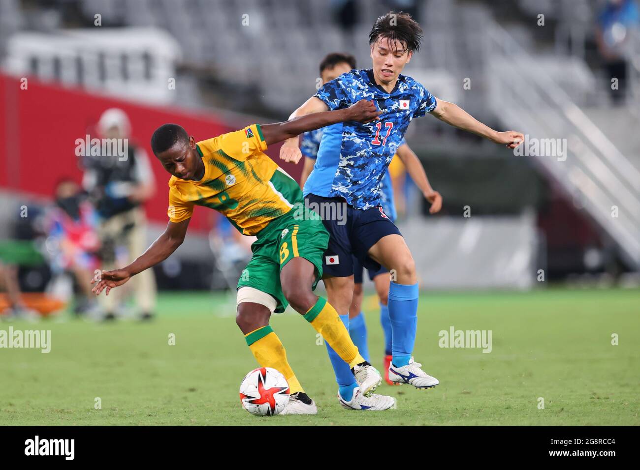 Tokyo, Japan. 22nd July, 2021. (L to R) Thabo Cele (RSA), Ao Tanaka (JPN) Football/Soccer : Men's First Round Group A match between Japan 1-0 South Africa during the Tokyo 2020 Olympic Games at the Tokyo Stadium in Tokyo, Japan . Credit: Naoki Morita/AFLO SPORT/Alamy Live News Stock Photo