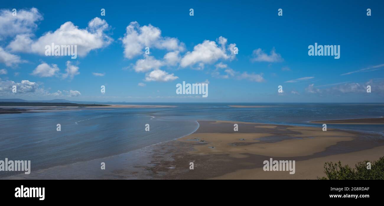 A panoramic shot of LLansteffan beach with clear blue water in southern Wales Stock Photo Alamy