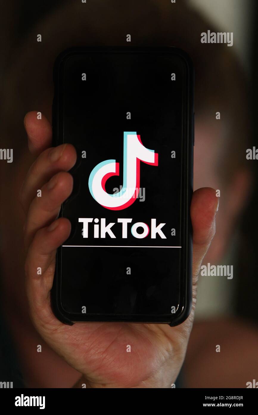 Amsterdam, Netherlands. 22nd July, 2021. In this photo illustration an internet user hold her smartphone as displays logo of the Chinese social media TikTok on July 22, 2021 in Amsterdam, Netherlands. Netherlands - The Dutch data protection agency DPA applied a fine of Û750,000 to the Chinese Social media company TikTok for violation of privacy young children in the Netherlands.(Photo by Paulo Amorim/Sipa USA) Credit: Sipa USA/Alamy Live News Stock Photo