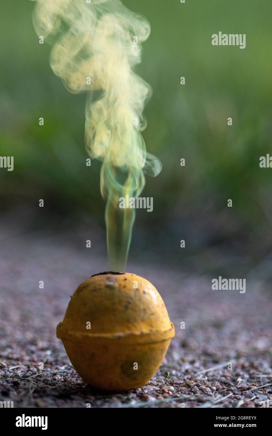 Vibrant colorful display of yellow smoke bombs celebrating independence