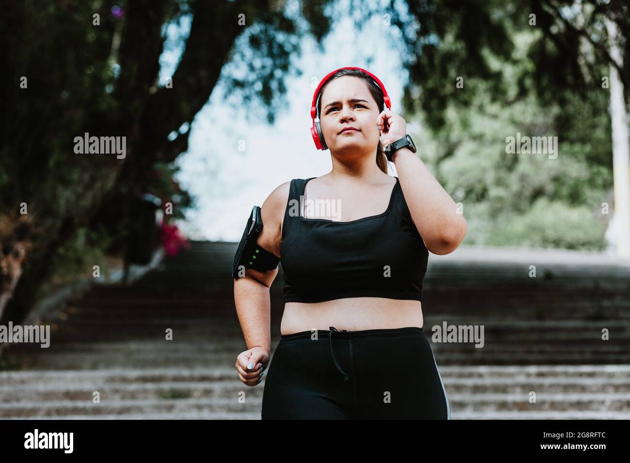 Plus size woman and running hi-res stock photography and images - Page 2 -  Alamy