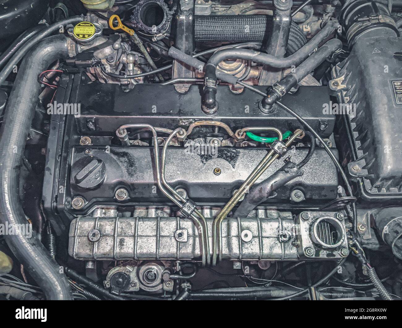 Top view of the engine and other parts of a modern car under the hood