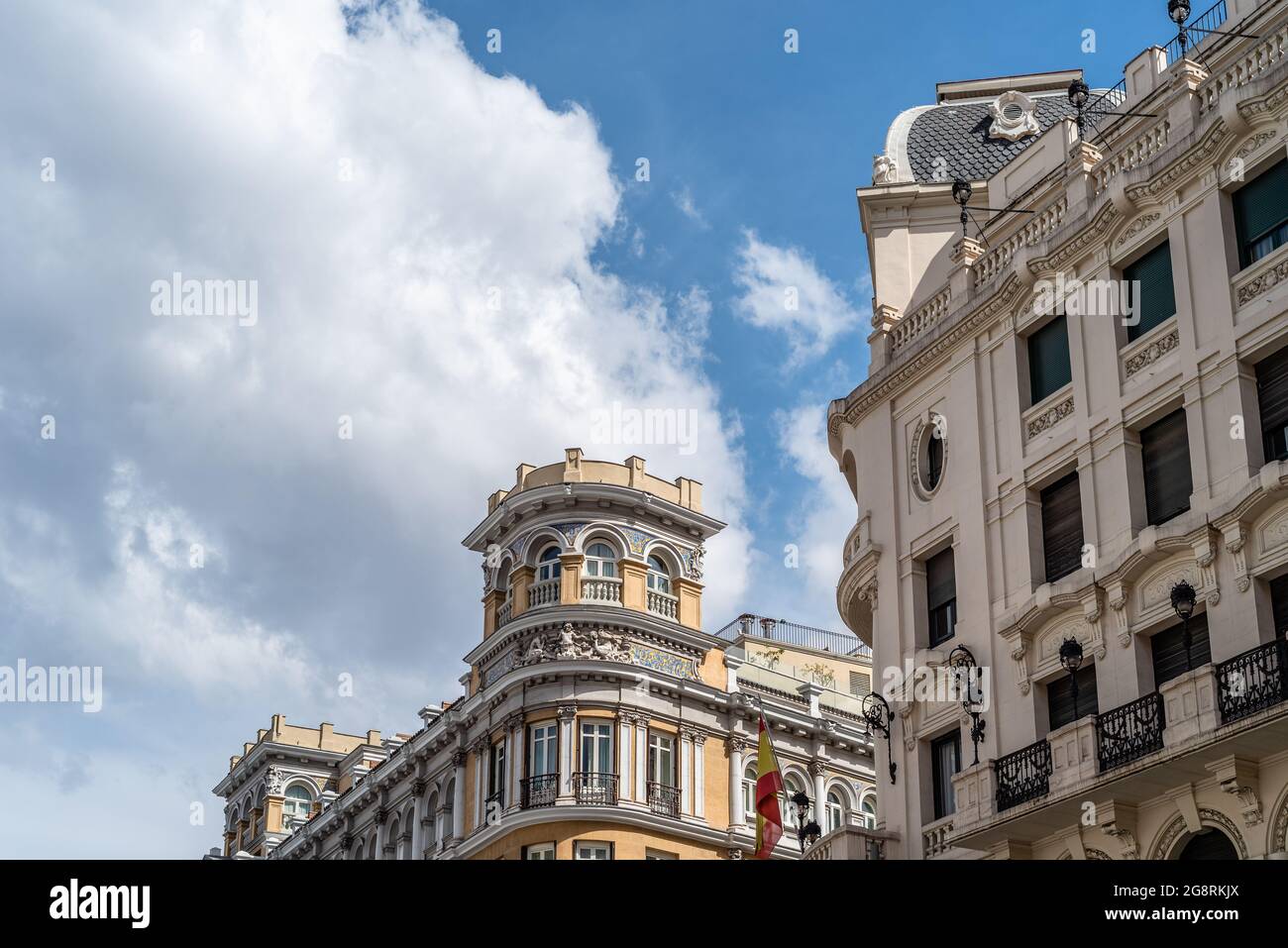 Historic residential buildings in Gran Via, the iconic avenue of Madrid