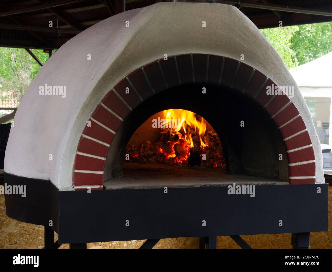 Vintage clay oven for cooking in a country house various dishes: flat  cakes, pizzas, pies, cereals, meat, fish and potatoes. The concept of  proximity Stock Photo - Alamy