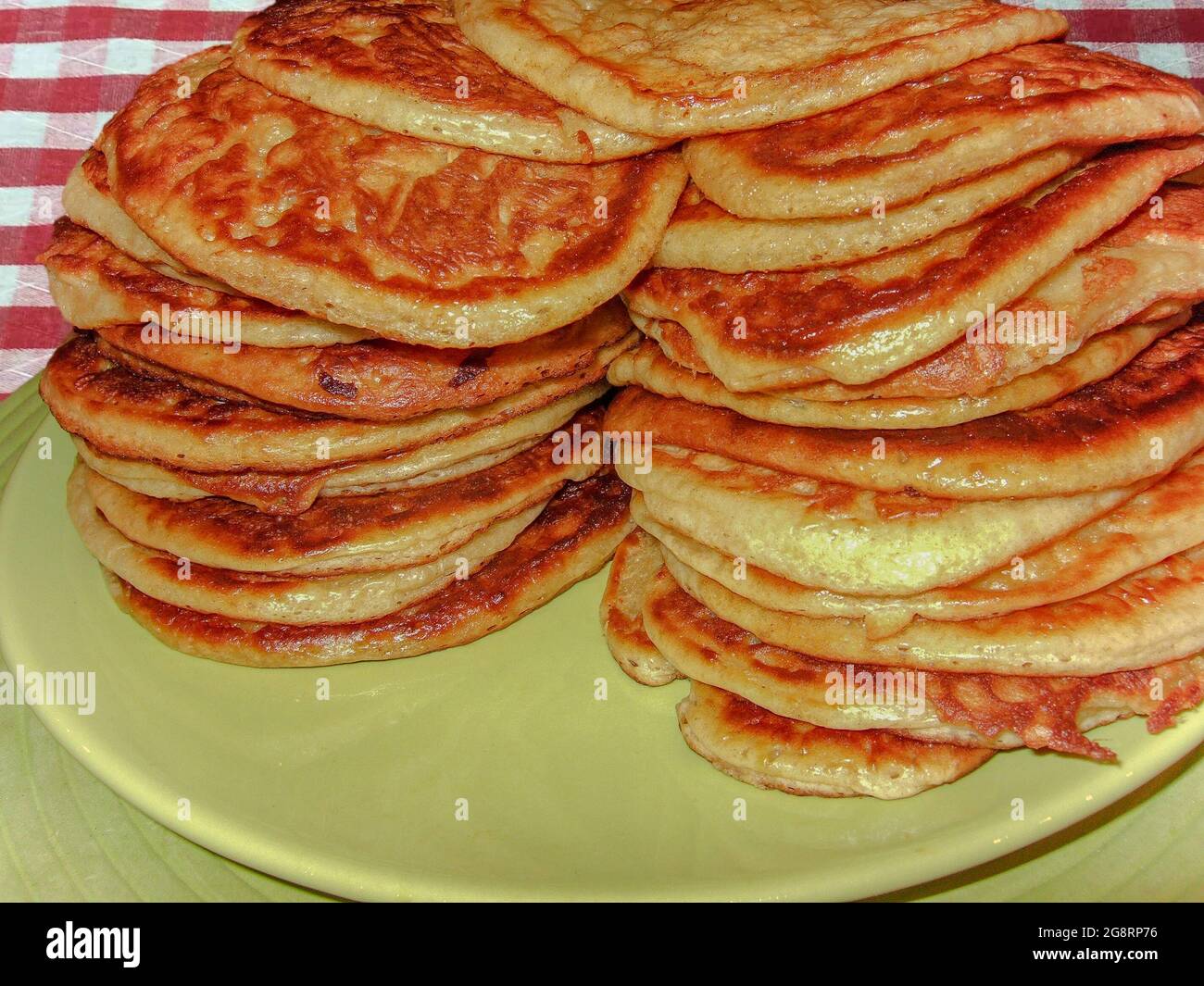 Fresh homemade traditional authentic rustic tortillas with butter. Stock Photo