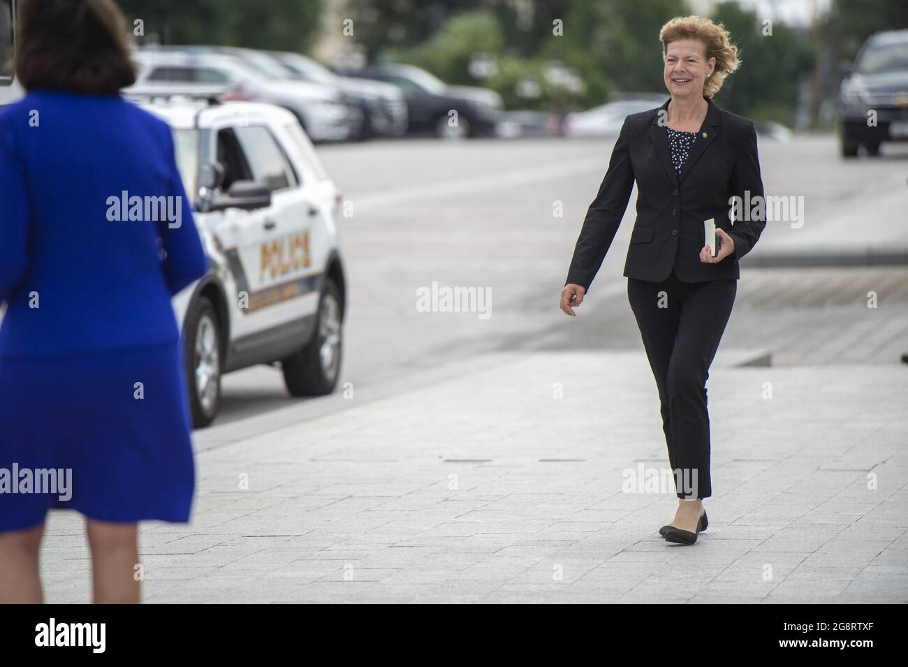Washington, United States. 22nd July, 2021. Sen. Tammy Baldwin, D-Wis., joins other senators on US Capitol Police buses to go to the White House, where President Joe Biden and Vice President Kamala Harris will sign the VOCA Fix to Sustain the Crime Victims Fund Act of 2021 into law on Thursday, July 22, 2021. Photo by Bonnie Cash/UPI Credit: UPI/Alamy Live News Stock Photo