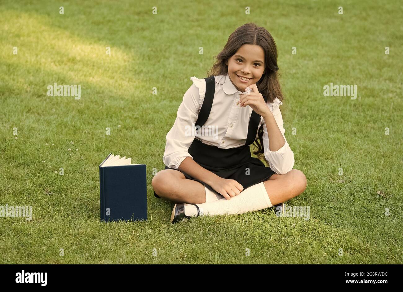 Be a reader. pretty child little girl read book. study literature for ...