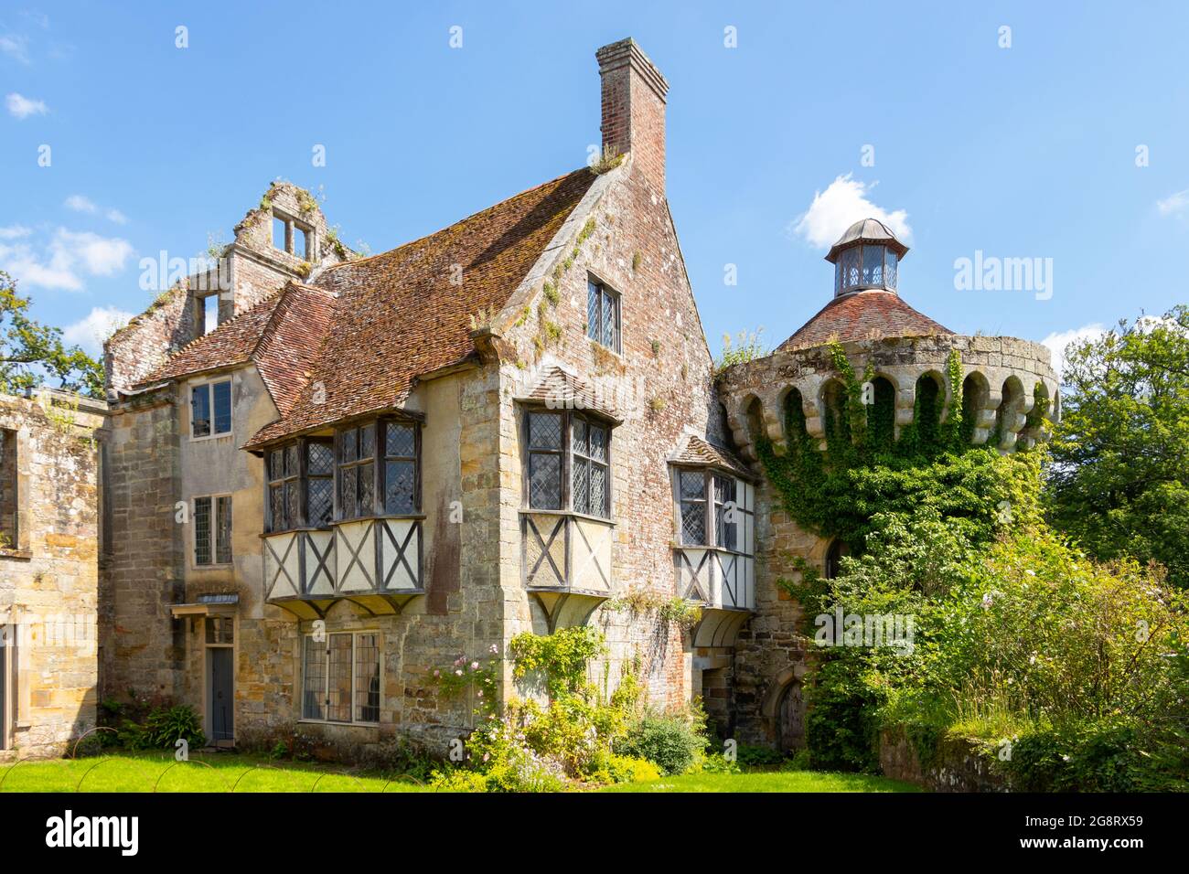 The 14th Century moated castle of Scotney castle in Kent Stock Photo ...