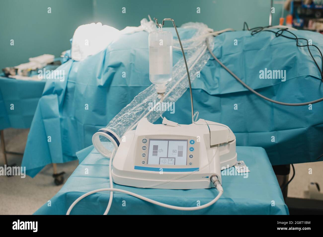 Surgical equipment during patient operation at modern hospital - Focus on ultrasonic surgery unit Stock Photo