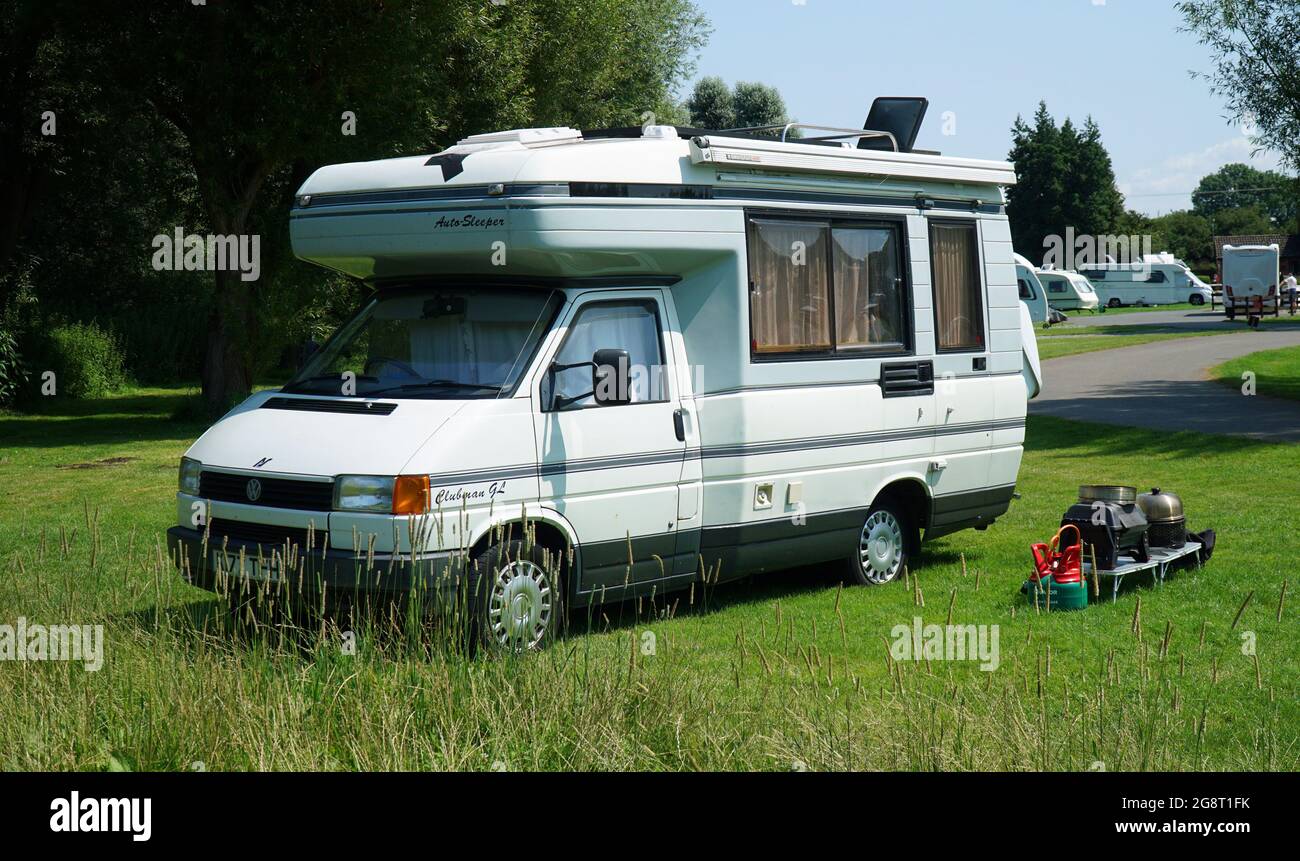 White VW Volkswagen Auto Sleeper Camper Van parked on camp Stock Photo -  Alamy