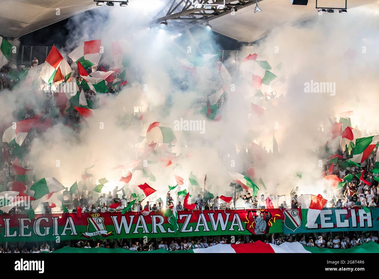 Warsaw, Poland. 21st July, 2021. Supporters of Legia seen during the UEFA Champions League Second Qualifying Round match between Legia Warszawa and FC Flora Tallinn at Marshal Jozef Pilsudski Legia Warsaw Municipal Stadium. (Final score; Legia Warszawa 2:1 FC Flora Tallinn) Credit: SOPA Images Limited/Alamy Live News Stock Photo