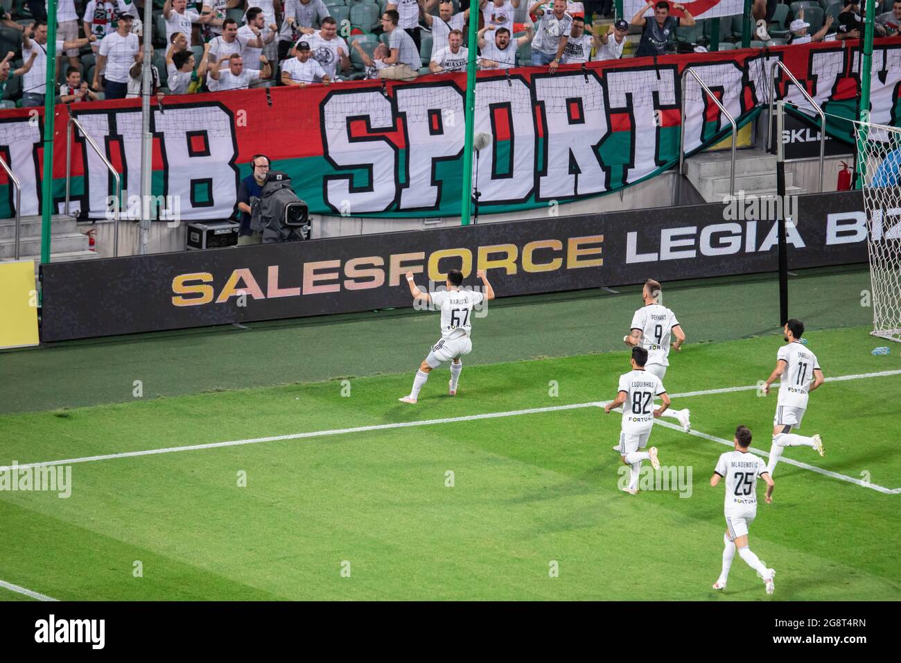 Warsaw, Poland. 21st July, 2021. Bartosz Kapustka of Legia celebrates a goal with teammates during the UEFA Champions League Second Qualifying Round match between Legia Warszawa and FC Flora Tallinn at Marshal Jozef Pilsudski Legia Warsaw Municipal Stadium. (Final score; Legia Warszawa 2:1 FC Flora Tallinn) Credit: SOPA Images Limited/Alamy Live News Stock Photo