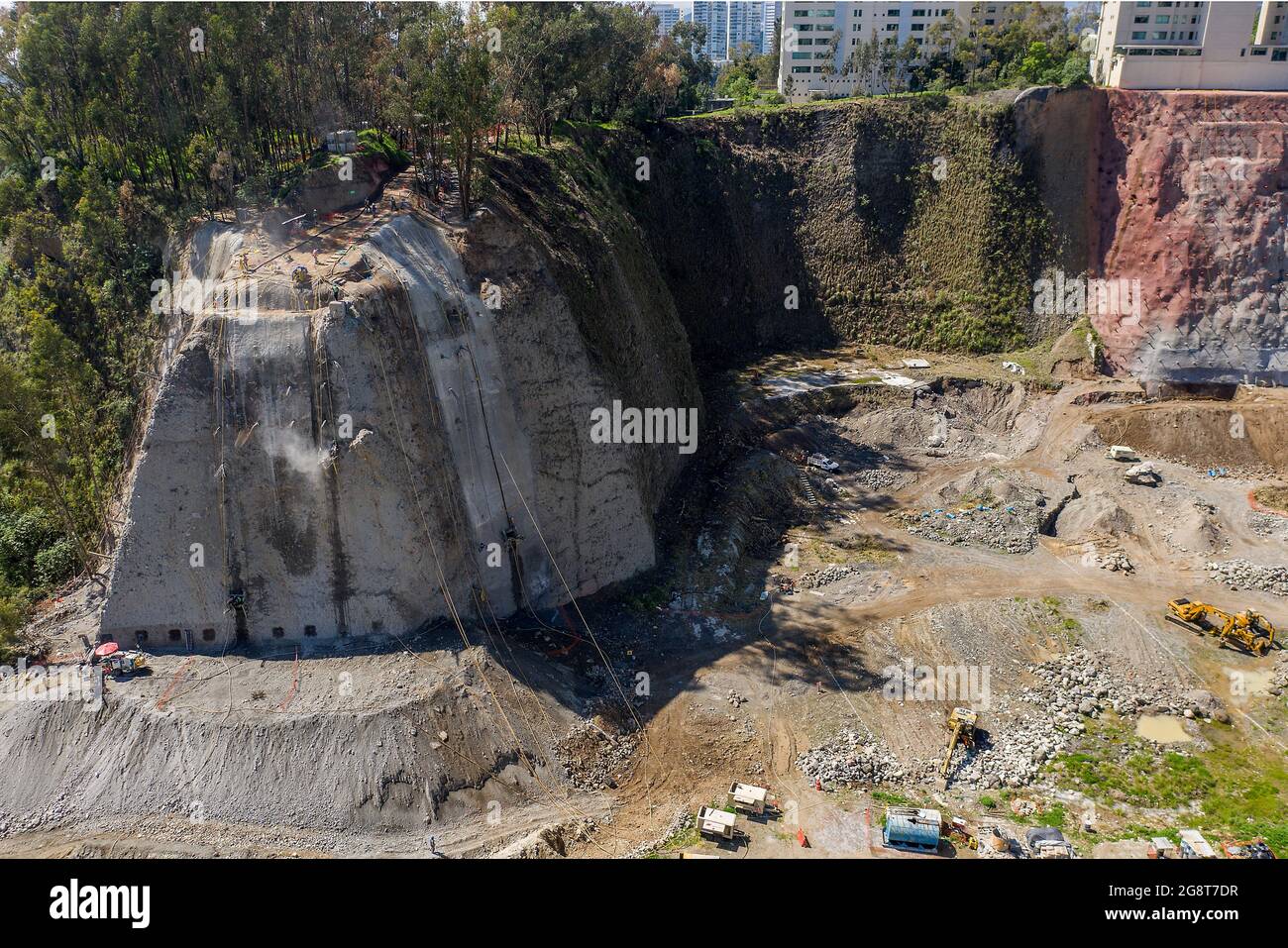 Cliff-face being reinforced in Santa Fe, Mexico City, Mexico Stock Photo