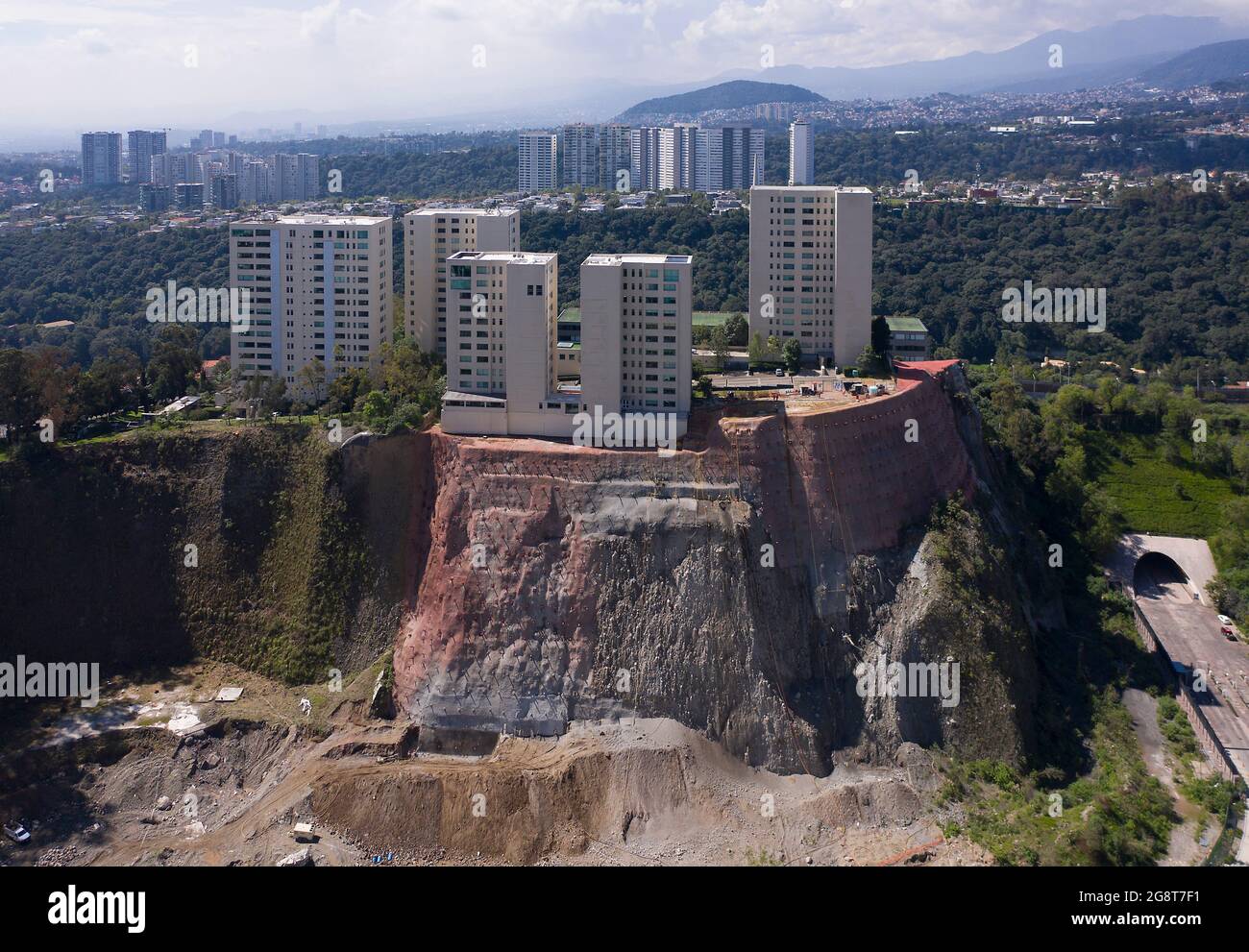 High-rise buildings perched above reinforced cliff-face Santa Fe, Mexico City, Mexico Stock Photo