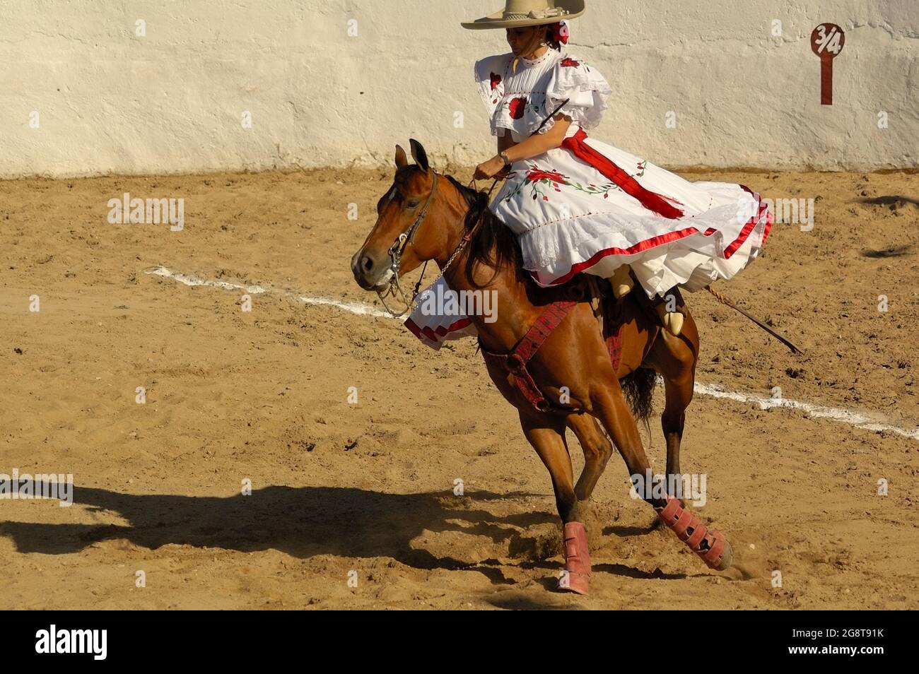 March 18, 2017- Merida, Yucatan, Mexico. "Escaramuza" competition at a "Lienzo Charro." The Escaramuza is a girls-only sport part of Mexican Charreria Stock Photo