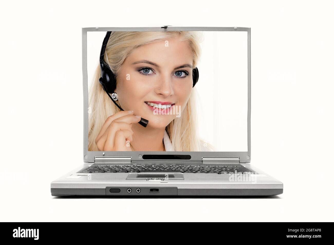 woman with headset on laptop display Stock Photo